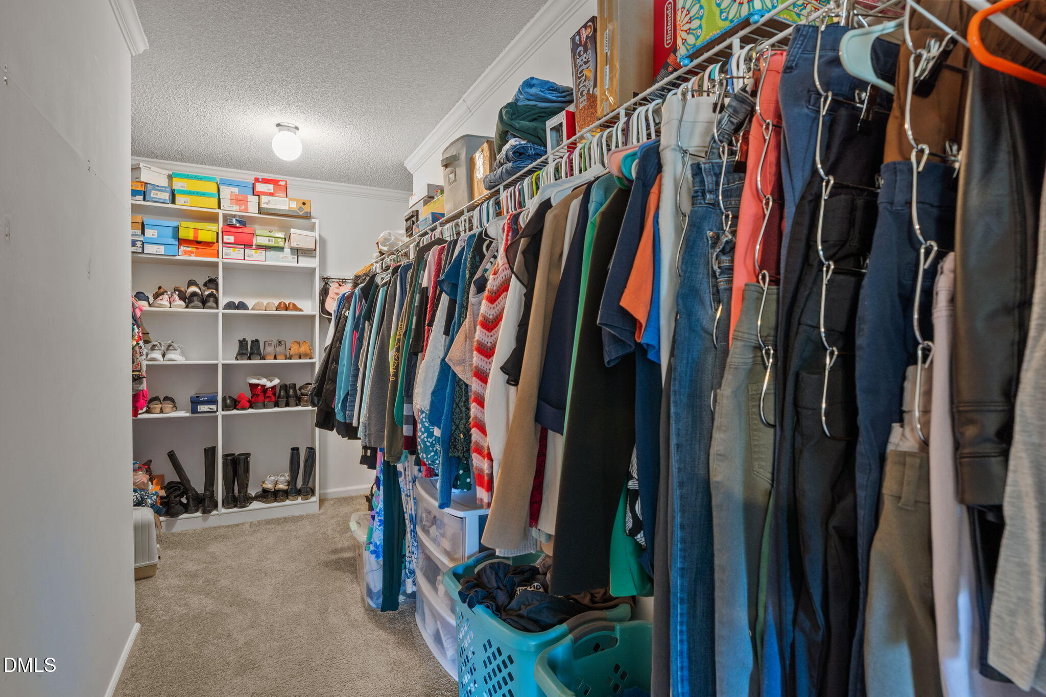 2450 Frazier Road Middlesex, NC 27557 - Photo 30 of 50 a view of walk in closet with clothes