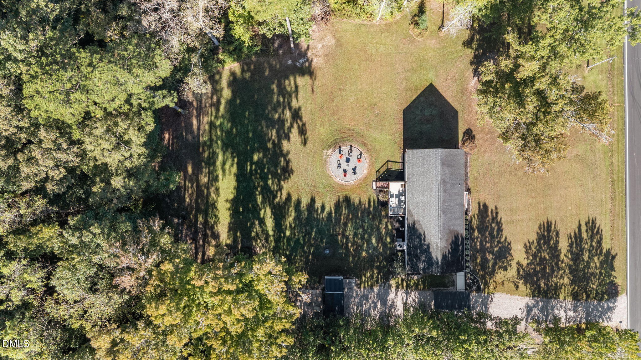 2450 Frazier Road Middlesex, NC 27557 - Photo 40 of 50 a view of a back yard of the house and trees all around