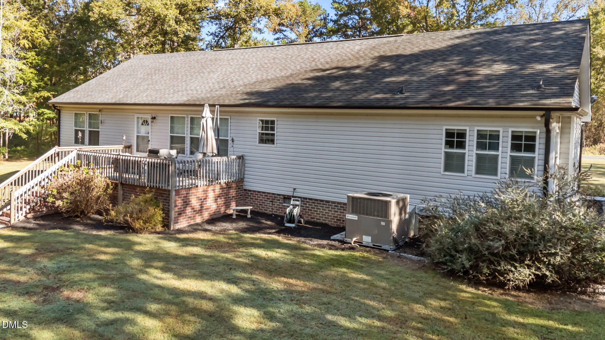 2450 Frazier Road Middlesex, NC 27557 - Photo 45 of 50 a view of a house with backyard and sitting area