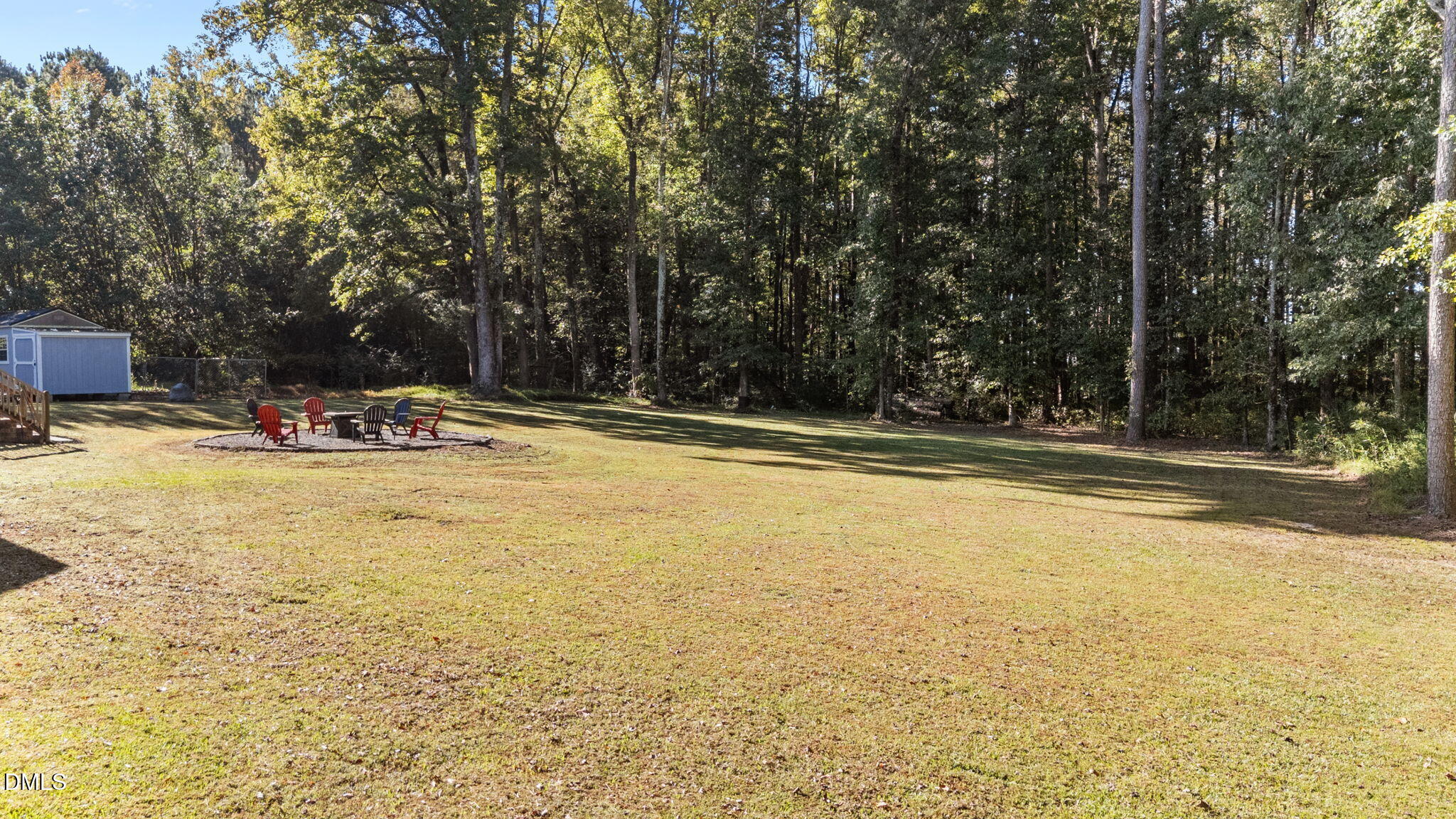 2450 Frazier Road Middlesex, NC 27557 - Photo 48 of 50 a view of swimming pool with outdoor seating and trees