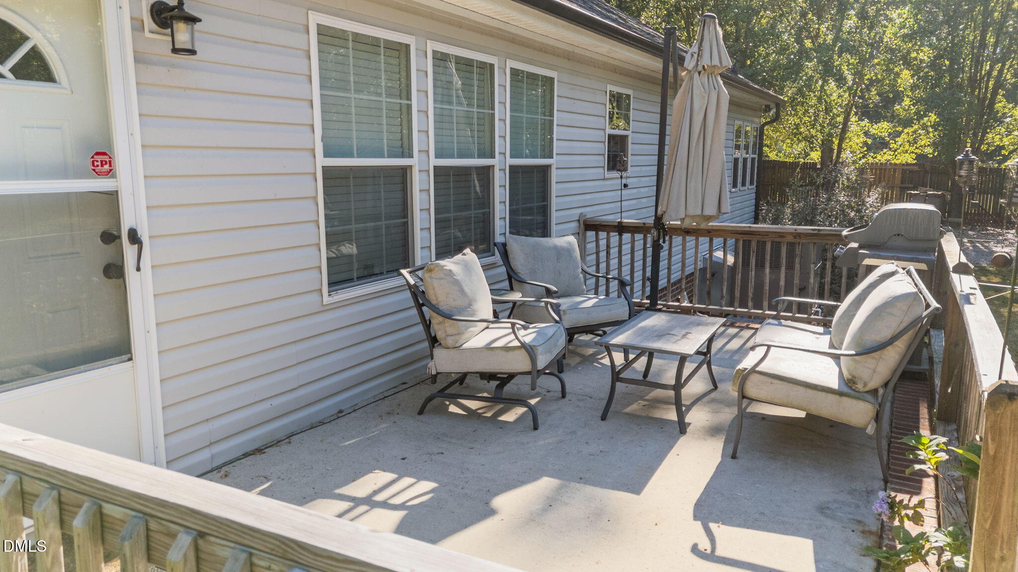 2450 Frazier Road Middlesex, NC 27557 - Photo 5 of 50 a view of a patio with a table and chairs