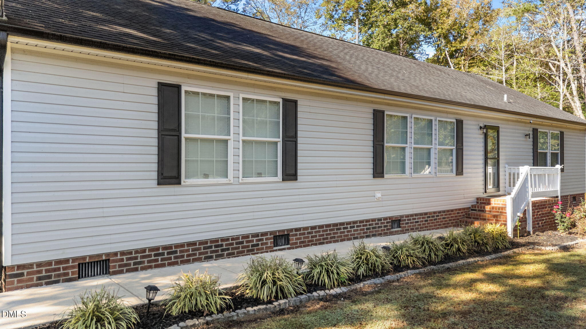 2450 Frazier Road Middlesex, NC 27557 - Photo 6 of 50 a front view of a house with a yard