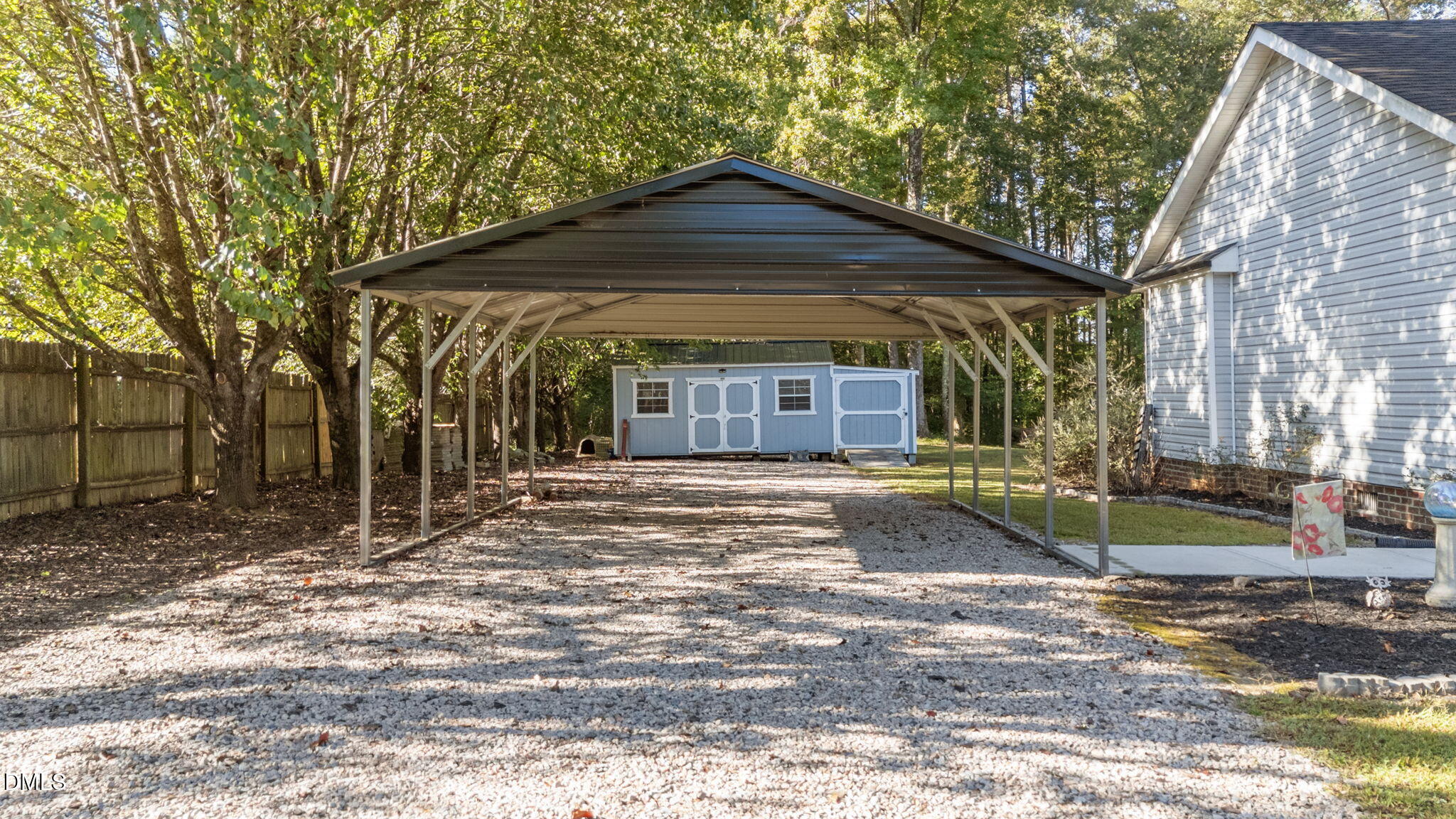 2450 Frazier Road Middlesex, NC 27557 - Photo 7 of 50 a front view of a house with garden