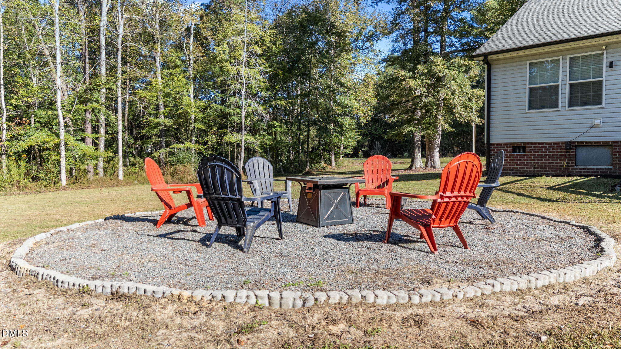2450 Frazier Road Middlesex, NC 27557 - Photo 10 of 50 a view of a backyard with chairs and table