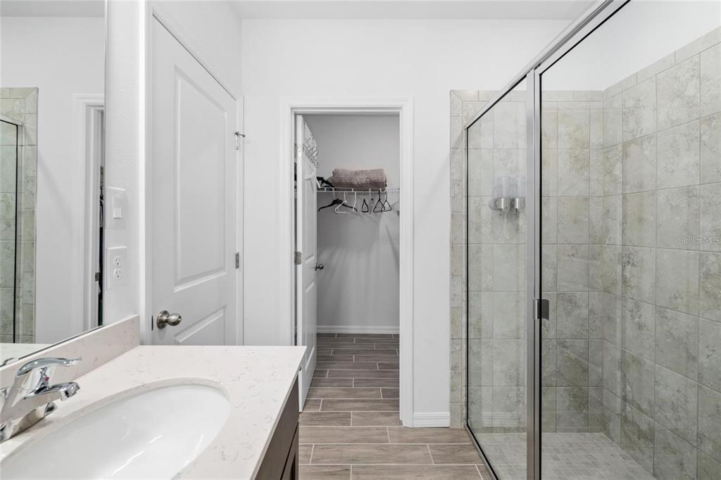 37 Ullman Place, Unit A Palm Coast, FL 32164 - Photo 15 of 20 a bathroom with a bathtub and shower