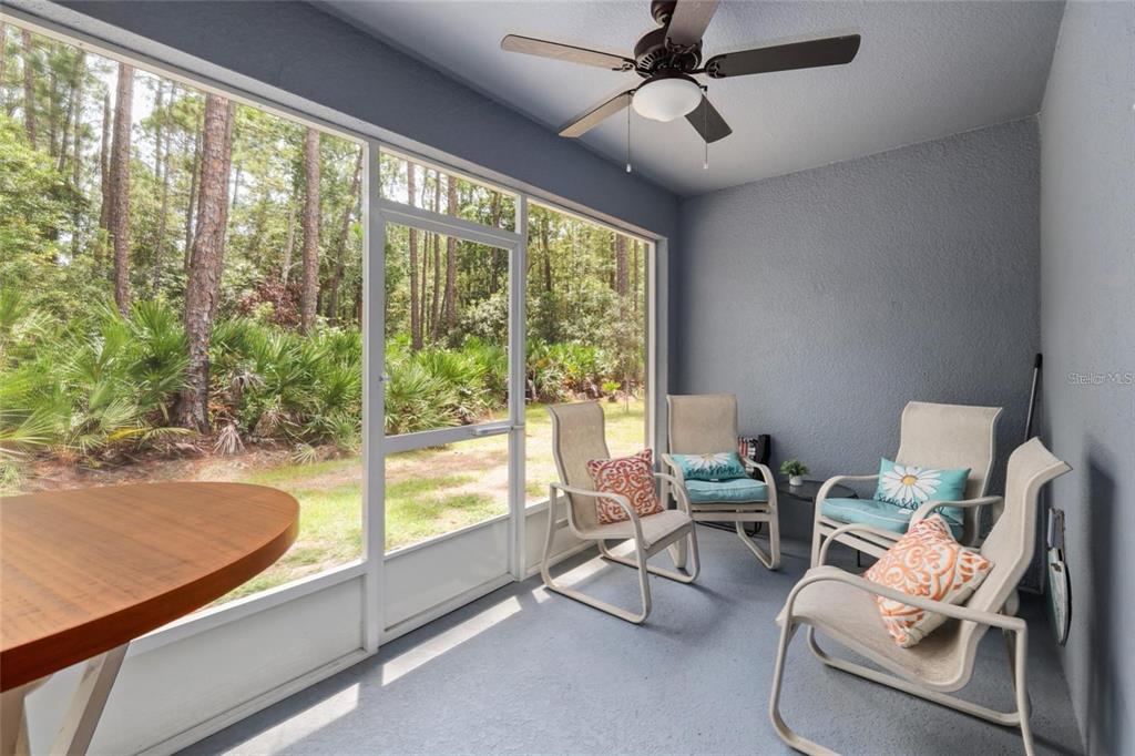 37 Ullman Place, Unit A Palm Coast, FL 32164 - Photo 17 of 20 a living room with furniture and a window