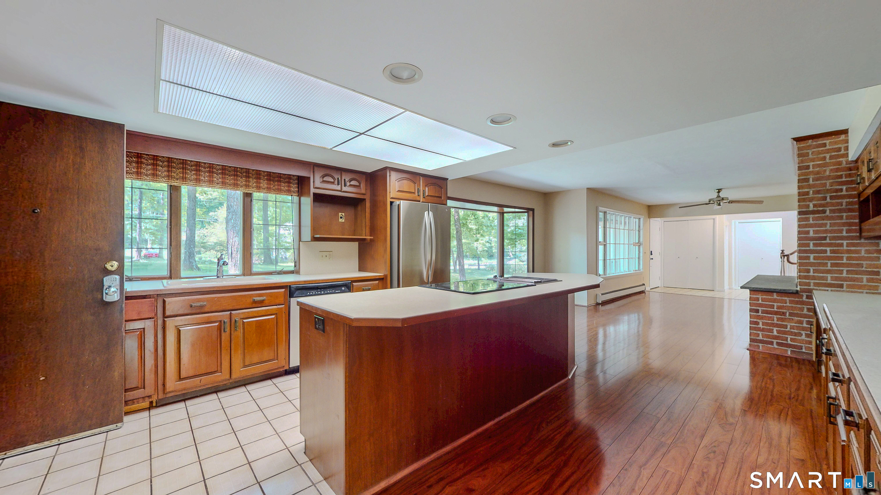133 Chambers Road Danbury, CT 06811 - Photo 6 of 30 a kitchen with stainless steel appliances granite countertop a stove a sink and a refrigerator