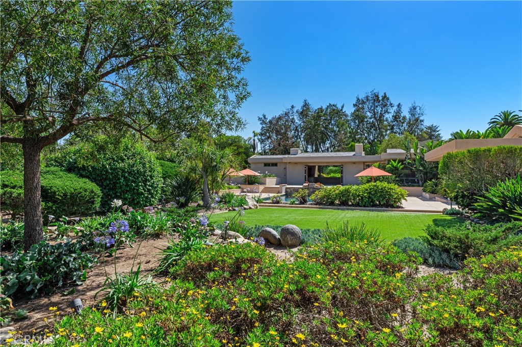 6533 Lago Lindo Rancho Santa Fe, CA 92067 - Photo 52 of 57 a view of an house with backyard space and garden