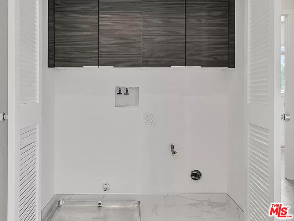 5750 Kester Avenue Van Nuys, CA 91411 - Photo 15 of 21 a bathroom with a shower