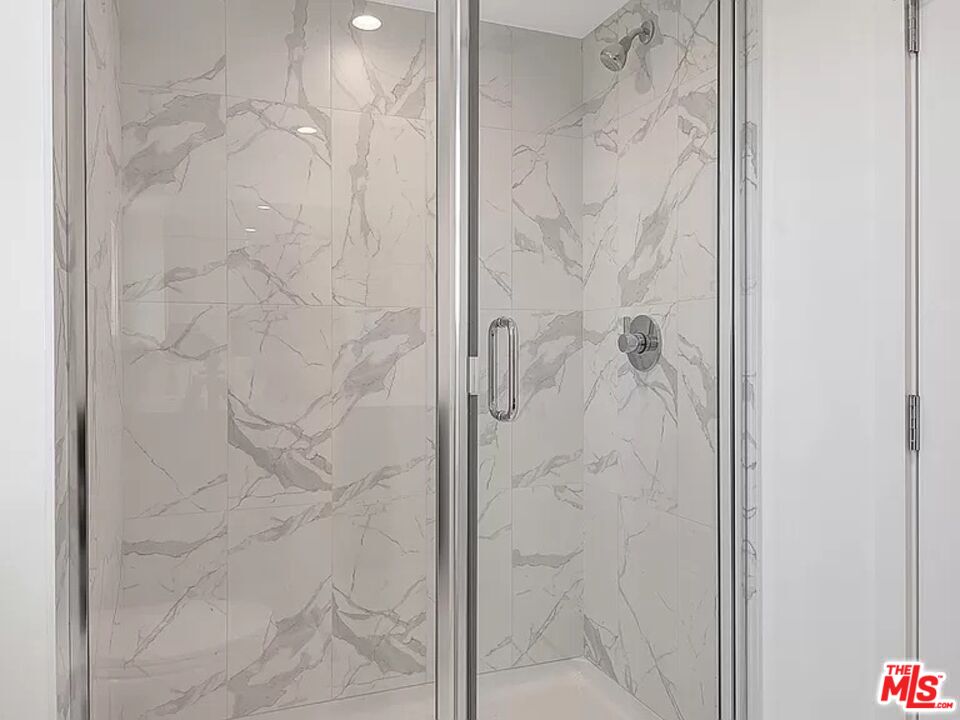 5750 Kester Avenue Van Nuys, CA 91411 - Photo 8 of 21 a bathroom with a shower