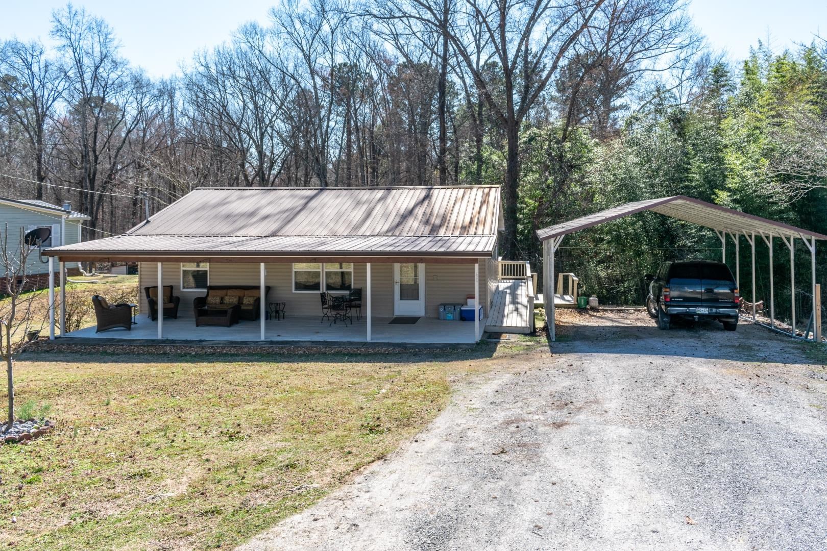 60 Bluebird Road Counce, TN 38326 - Photo 1 of 22 a view of a house with garden and sitting area