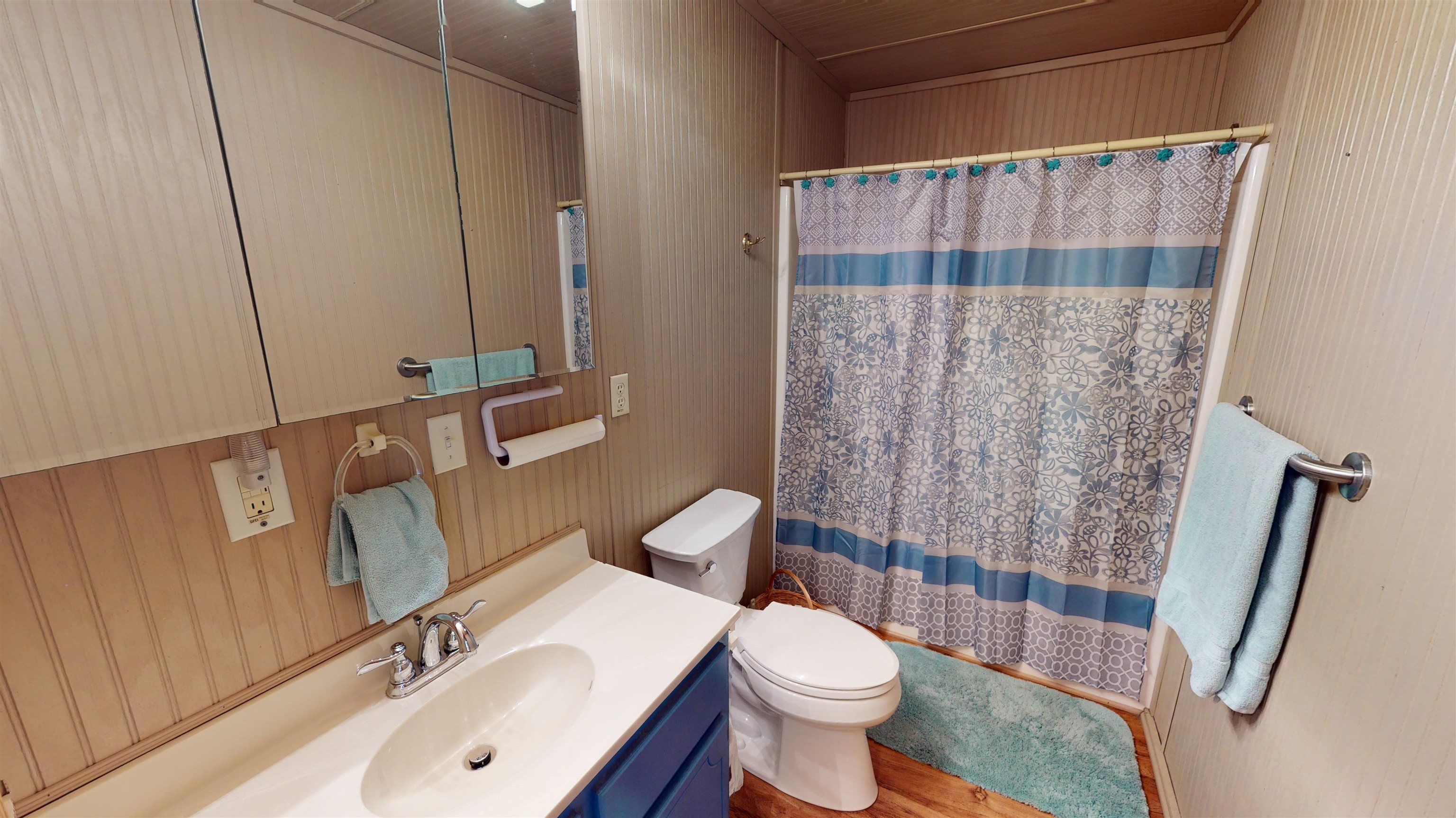 60 Bluebird Road Counce, TN 38326 - Photo 11 of 22 a bathroom with a sink a toilet and shower