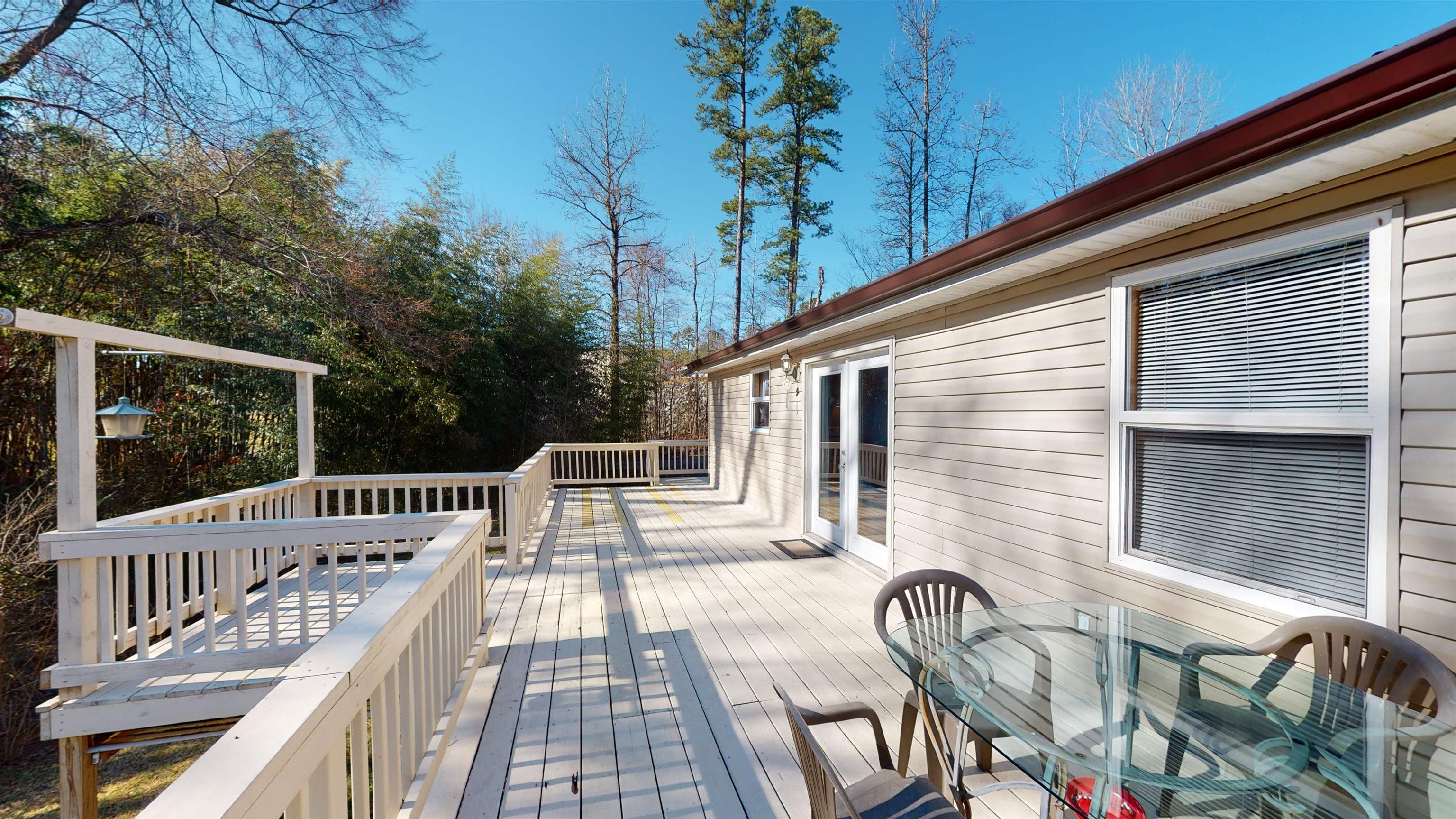 60 Bluebird Road Counce, TN 38326 - Photo 15 of 22 a view of deck with two chairs and potted plants