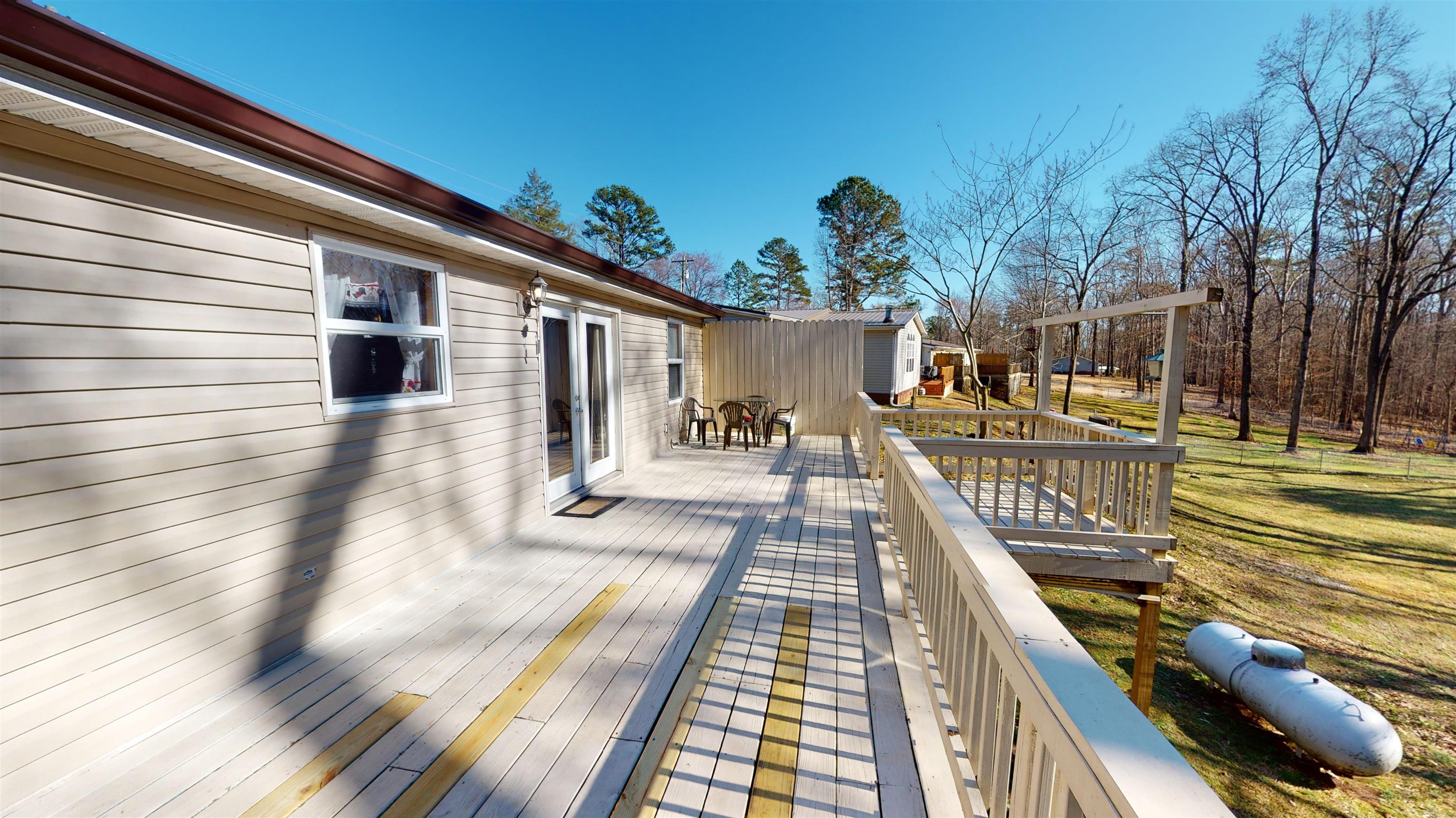 60 Bluebird Road Counce, TN 38326 - Photo 17 of 22 a view of a balcony with chairs