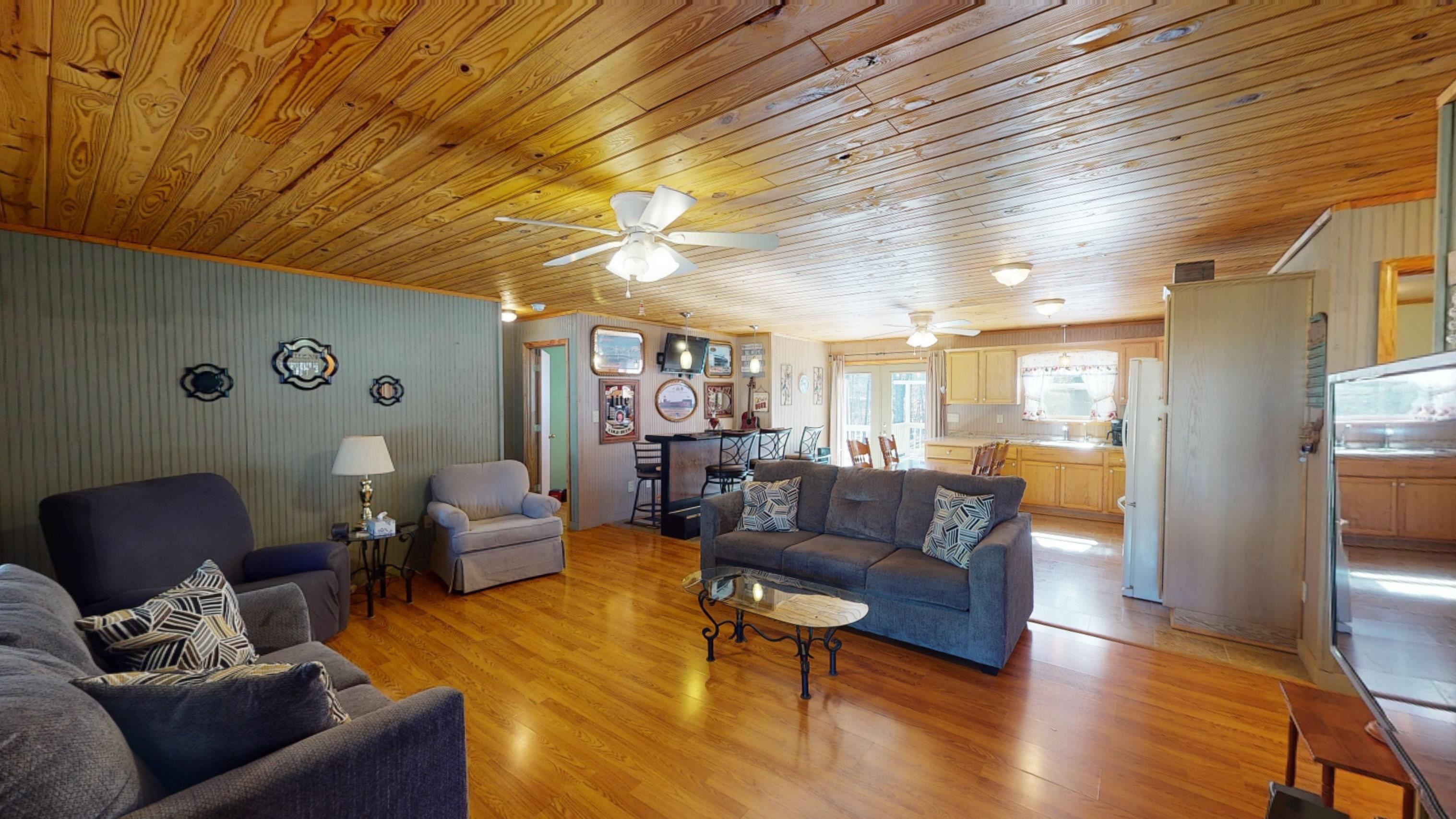 60 Bluebird Road Counce, TN 38326 - Photo 2 of 22 a living room with furniture and a wooden floor