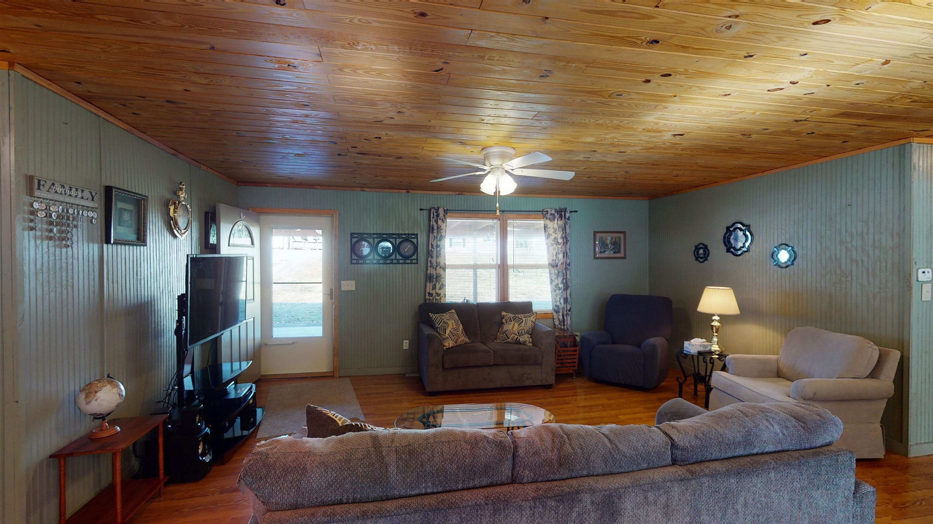 60 Bluebird Road Counce, TN 38326 - Photo 5 of 22 a living room with furniture and a window