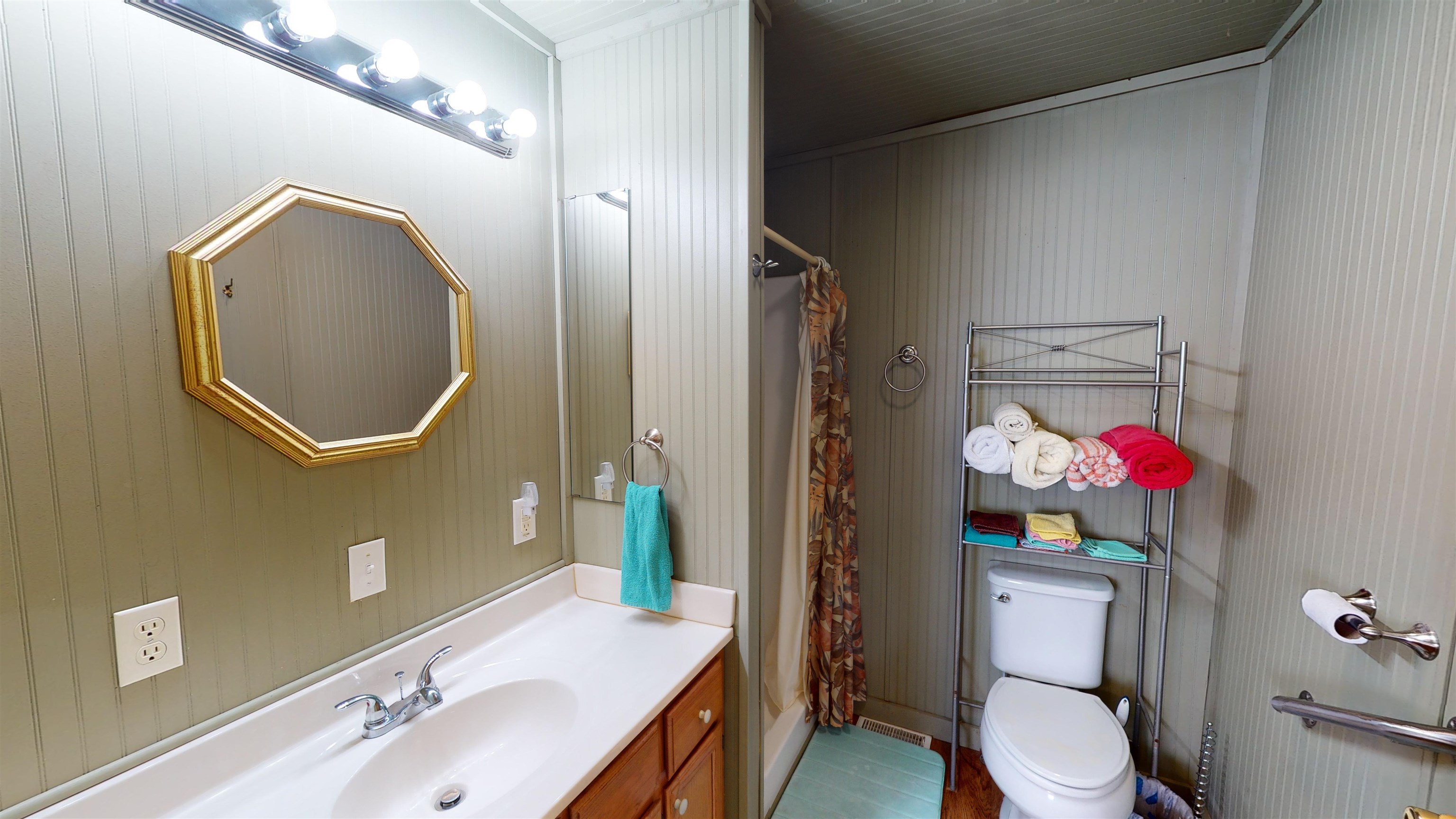 60 Bluebird Road Counce, TN 38326 - Photo 8 of 22 a bathroom with a sink mirror vanity and toilet