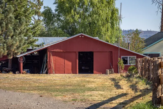 a view of a backyard of the house