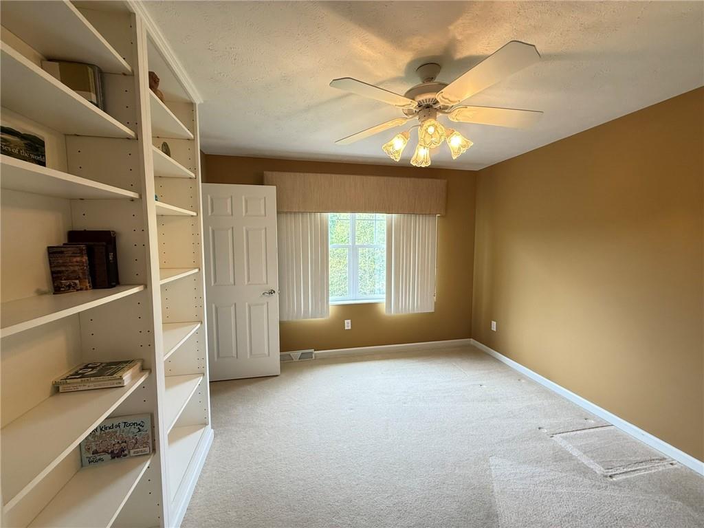 411 Chestnut Lane Apollo, PA 15613 - Photo 21 of 38 a view of an empty room with a window