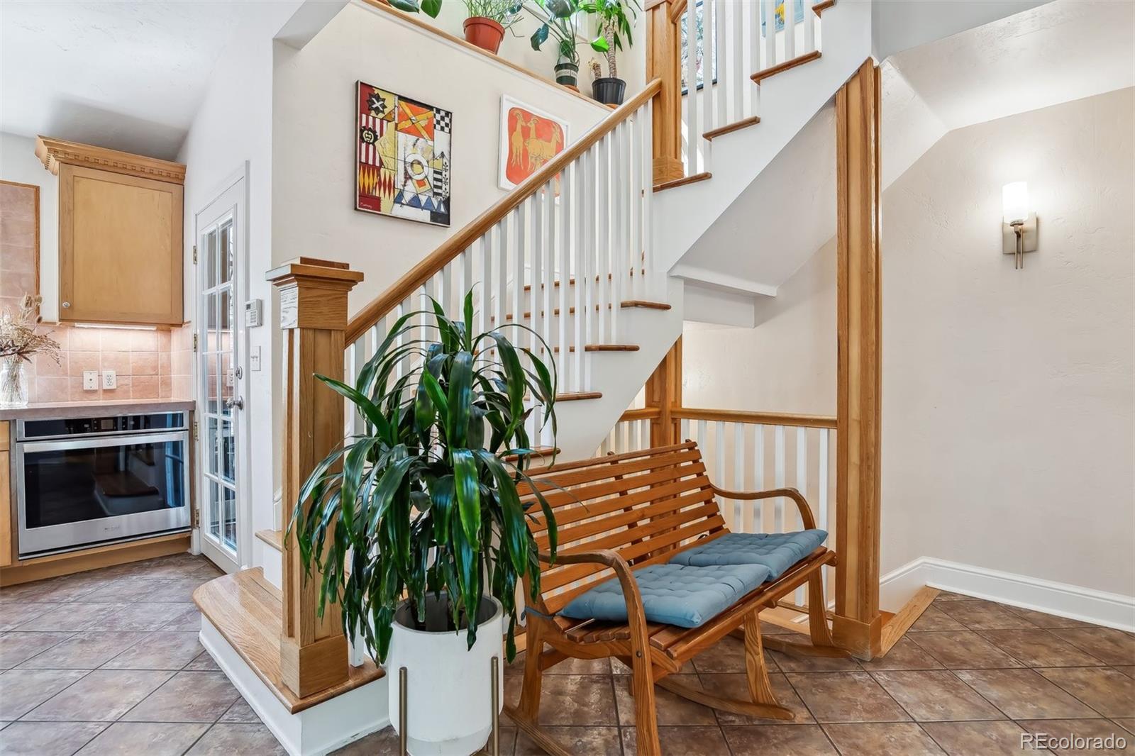 1377 Cherry Street Denver, CO 80220 - Photo 18 of 50 a view of stairs and with furniture