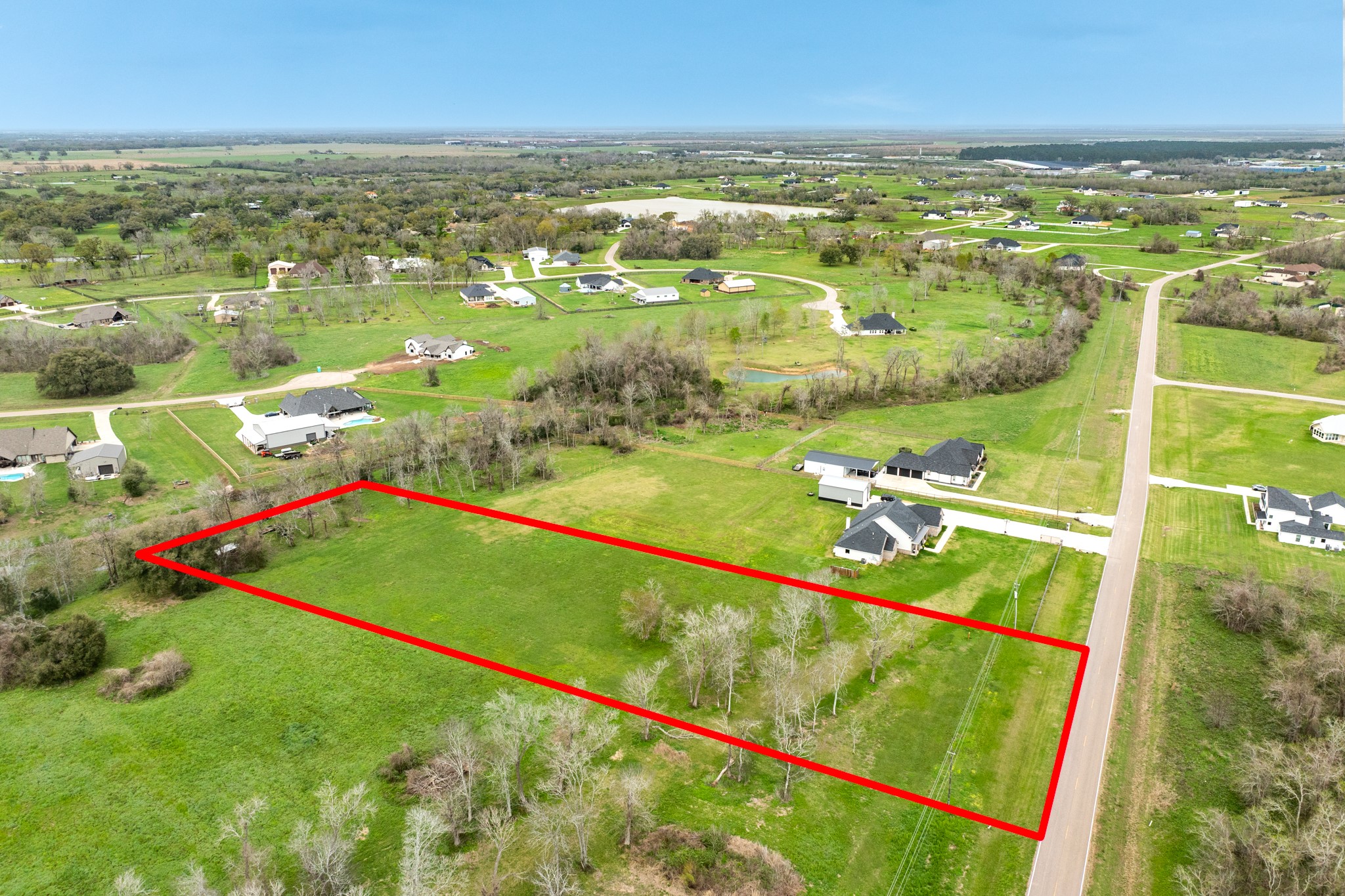 810 Chenango Ranch Drive Angleton, TX 77515 - Photo 3 of 10 a view of an outdoor space and a lake view