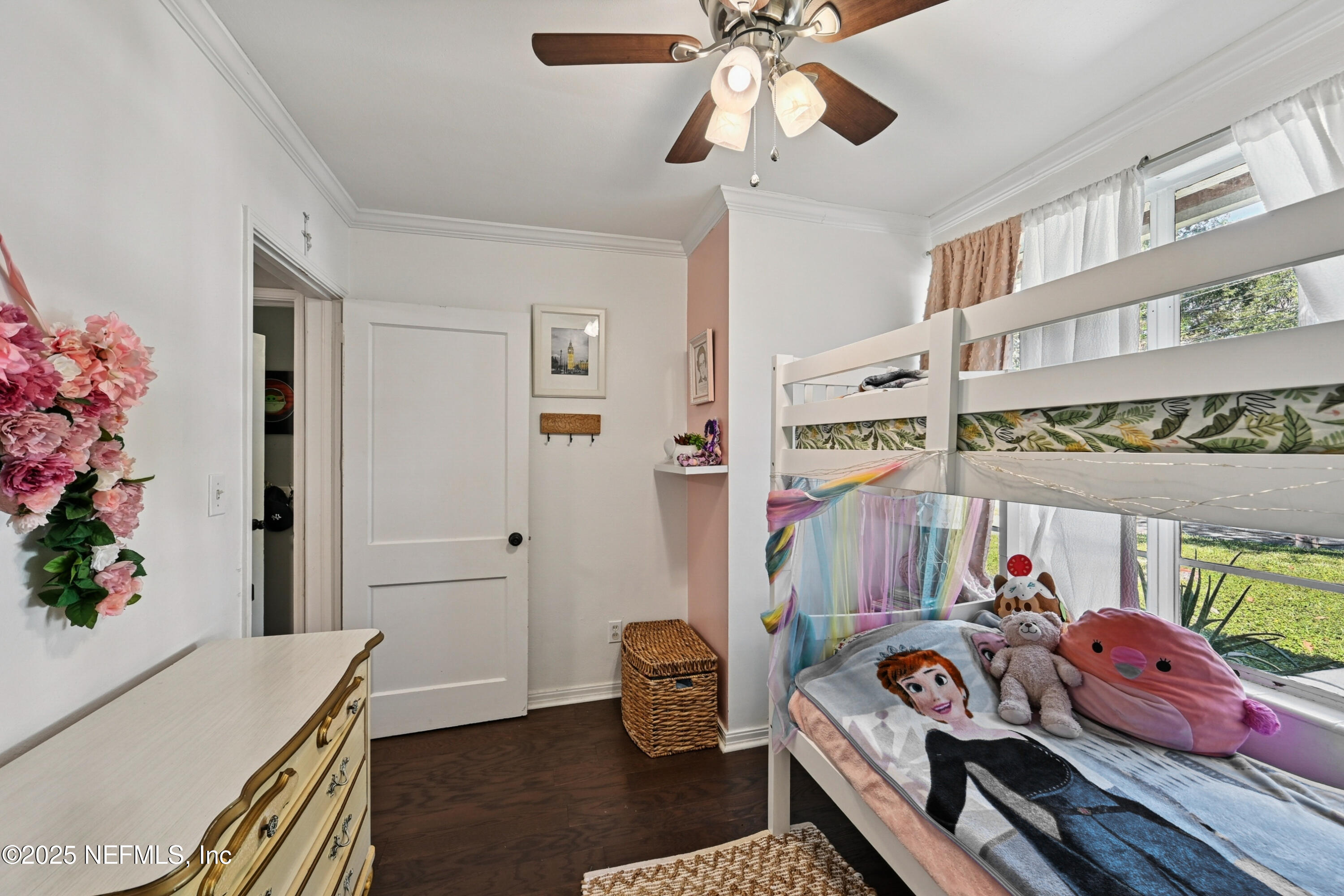 1316 Rensselaer Avenue Jacksonville, FL 32205 - Photo 18 of 46 a bedroom with a bed and wooden floor