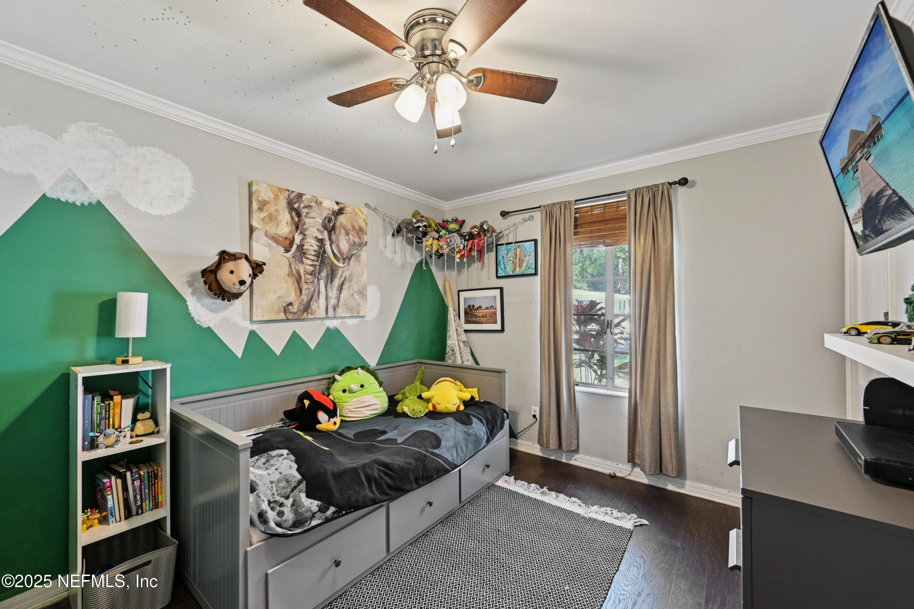1316 Rensselaer Avenue Jacksonville, FL 32205 - Photo 22 of 46 a living room with furniture and a flat screen tv