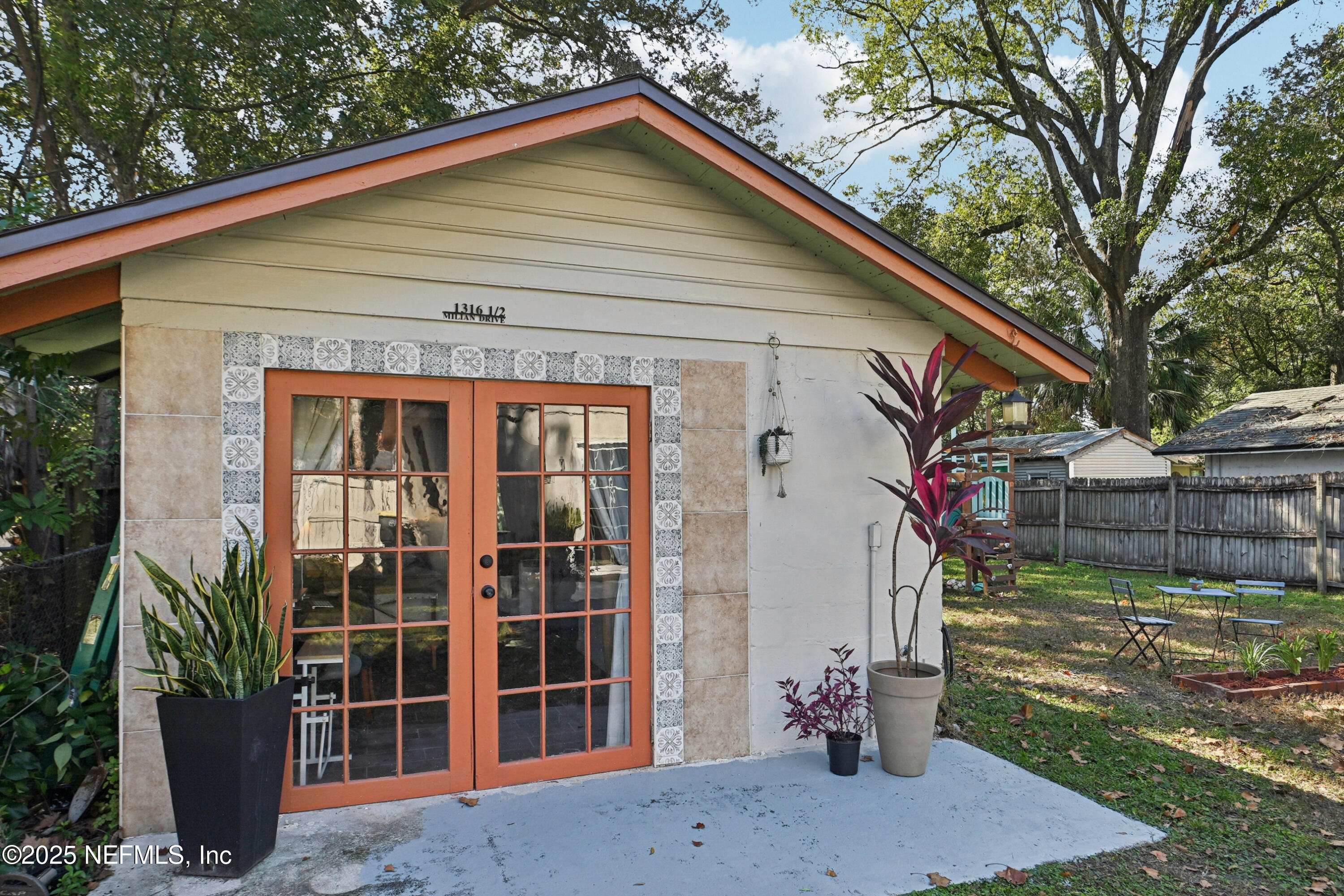 1316 Rensselaer Avenue Jacksonville, FL 32205 - Photo 27 of 46 a front view of a house with a yard