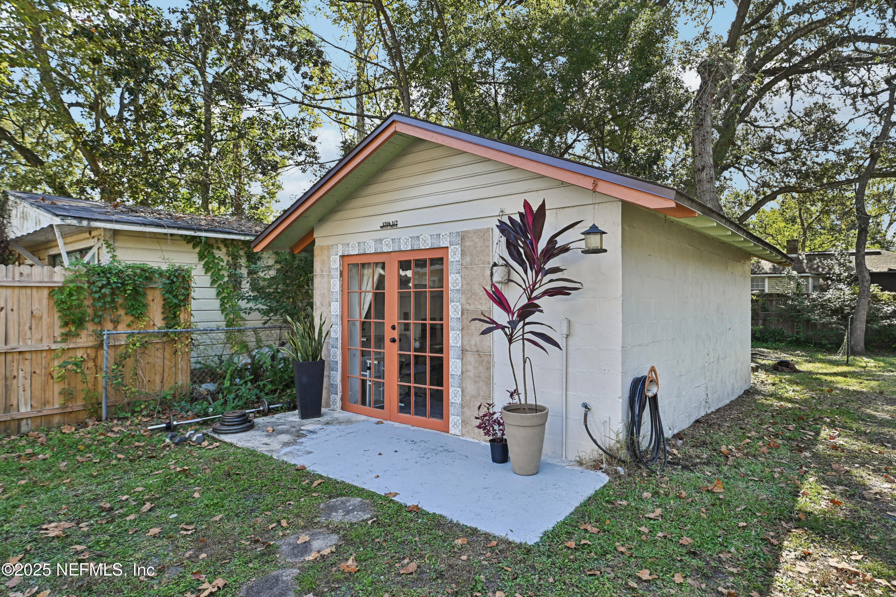 1316 Rensselaer Avenue Jacksonville, FL 32205 - Photo 29 of 46 a view of a house with backyard and a tree