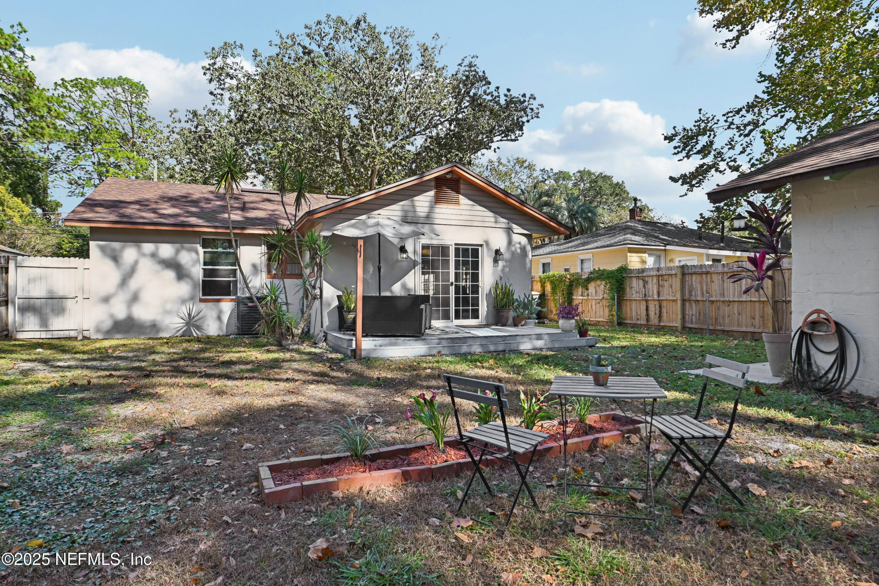 1316 Rensselaer Avenue Jacksonville, FL 32205 - Photo 36 of 46 a view of a house with backyard sitting area and garden