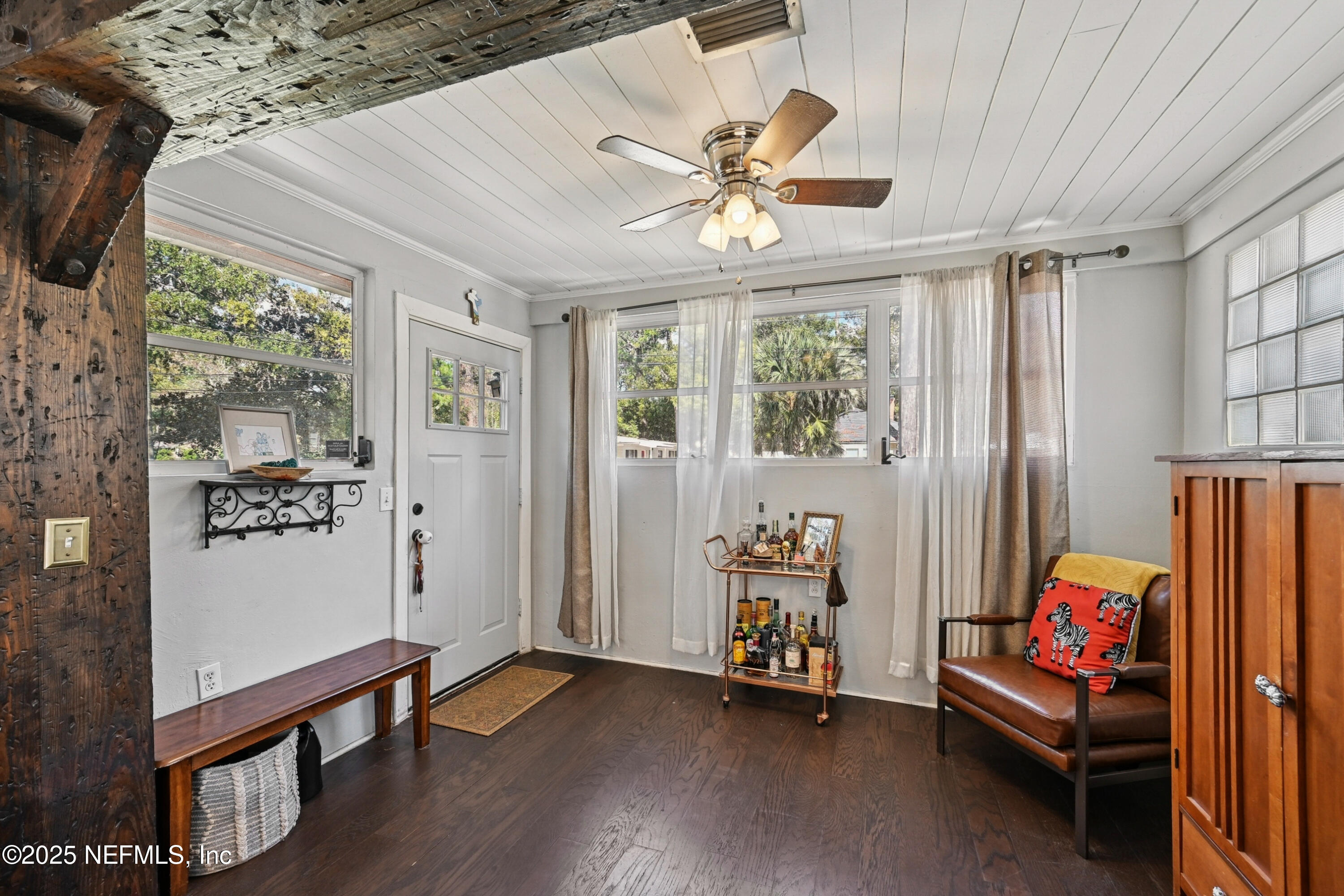 1316 Rensselaer Avenue Jacksonville, FL 32205 - Photo 4 of 46 a view of a bedroom with furniture window and wooden floor