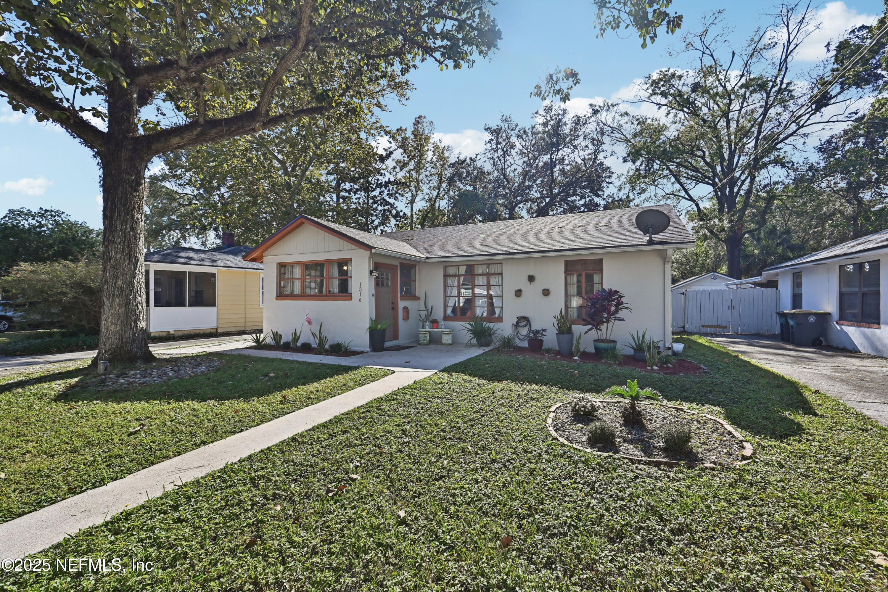 1316 Rensselaer Avenue Jacksonville, FL 32205 - Photo 44 of 46 front view of a house with a yard