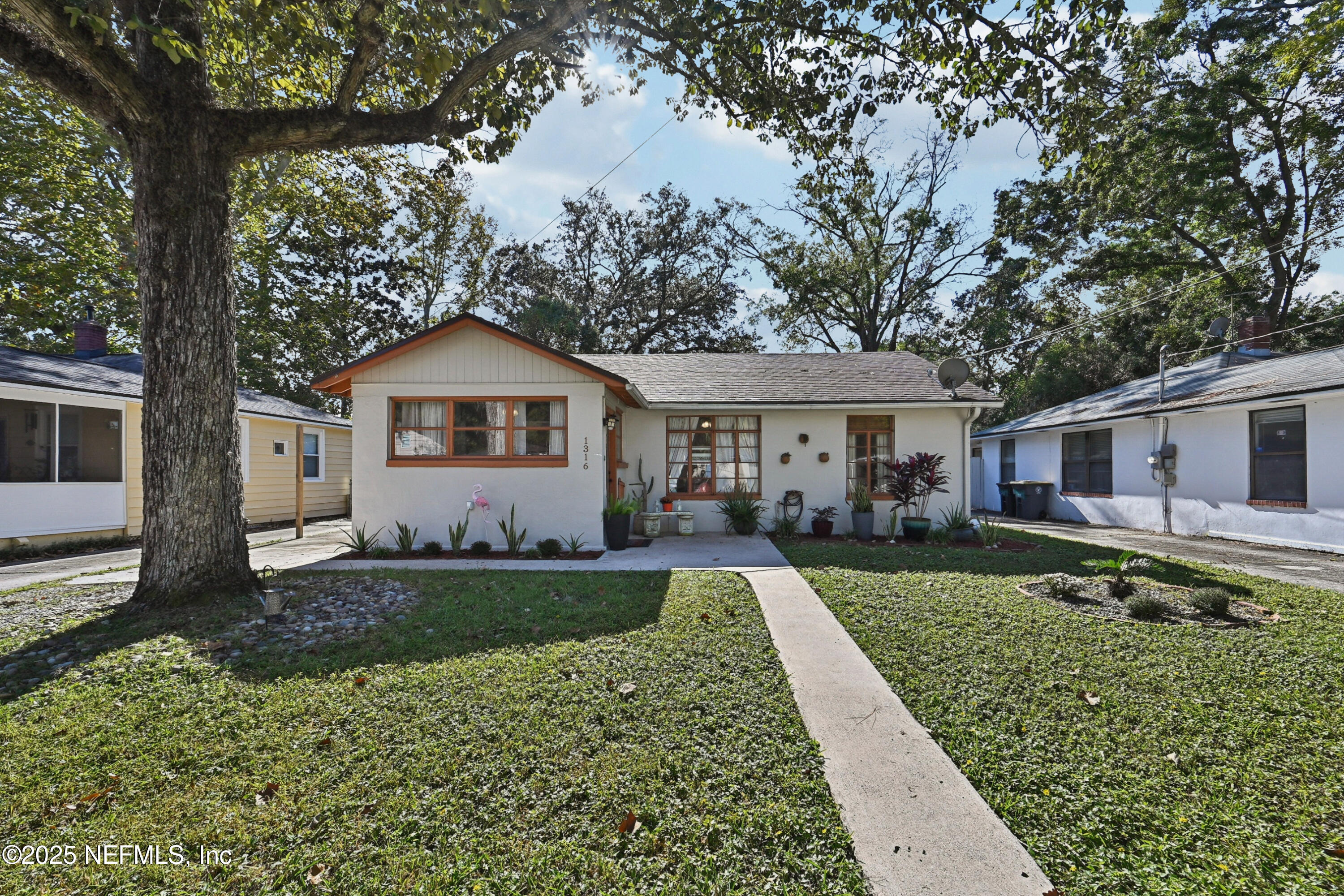 1316 Rensselaer Avenue Jacksonville, FL 32205 - Photo 45 of 46 a front view of a house with a yard