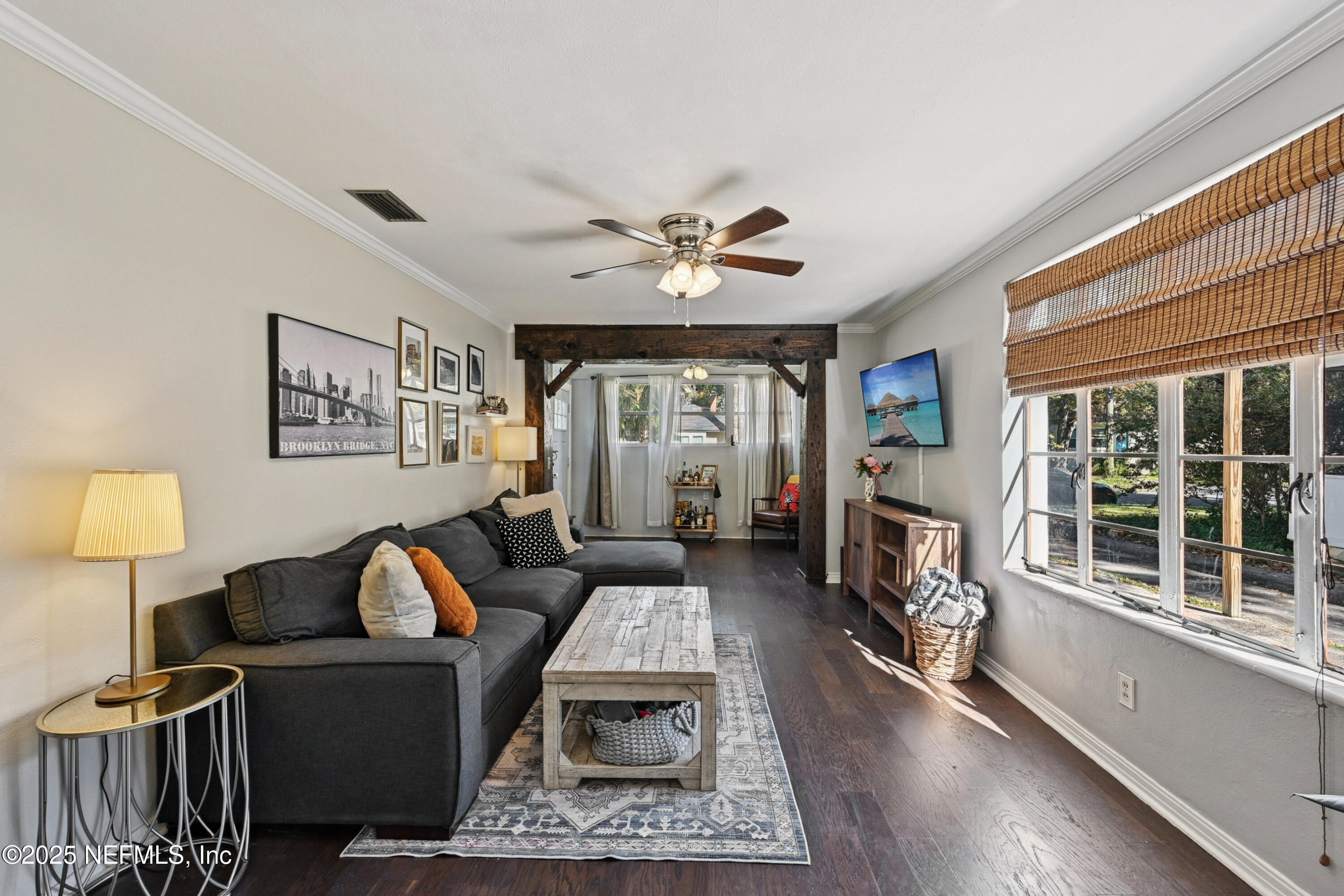 1316 Rensselaer Avenue Jacksonville, FL 32205 - Photo 7 of 46 a living room with furniture a table and a large window