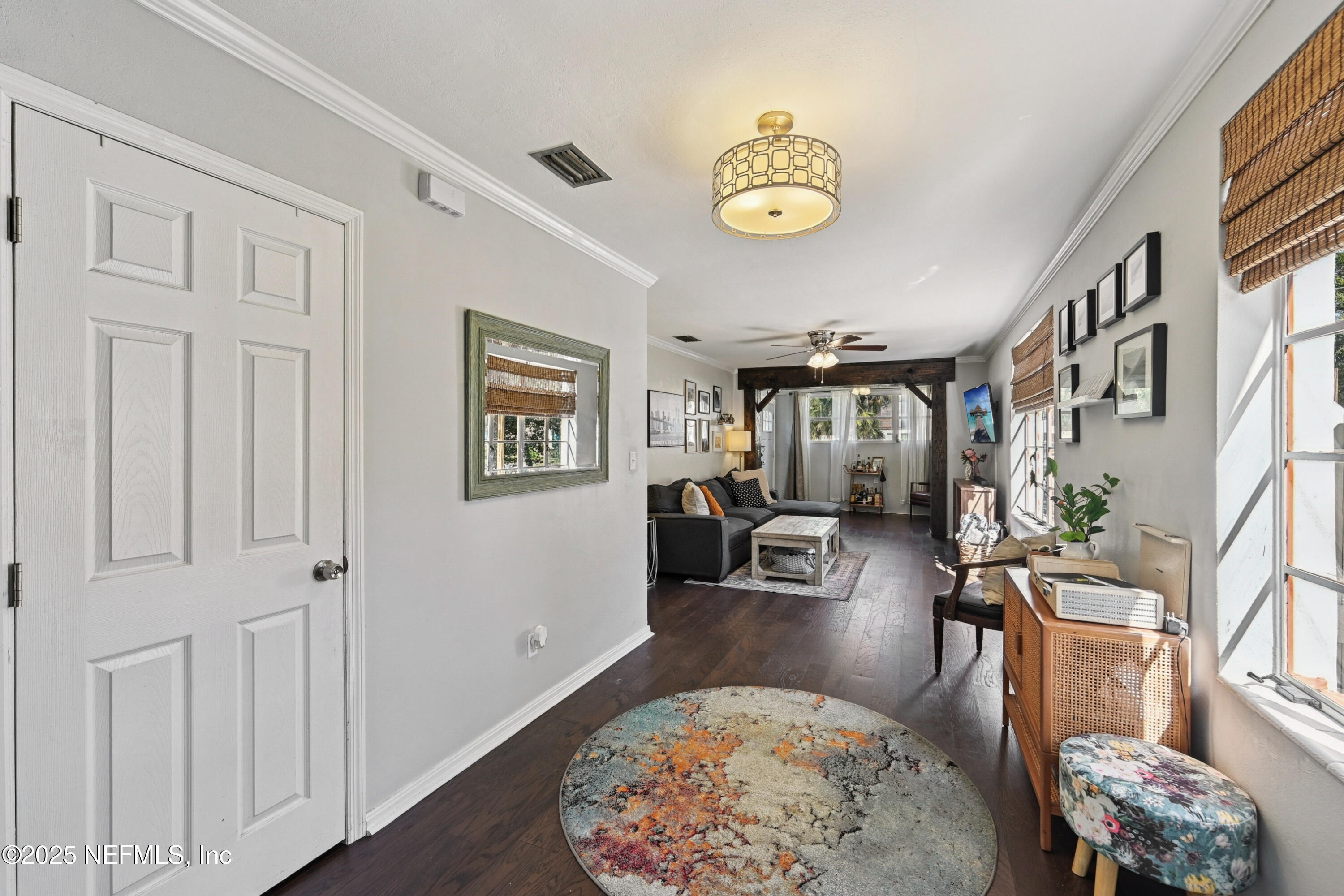 1316 Rensselaer Avenue Jacksonville, FL 32205 - Photo 8 of 46 a living room with furniture and a window