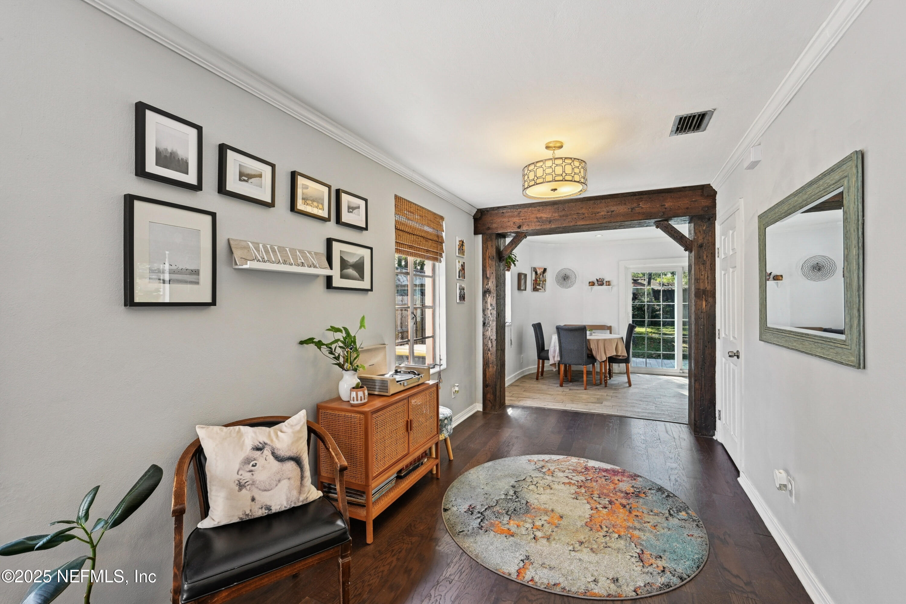 1316 Rensselaer Avenue Jacksonville, FL 32205 - Photo 9 of 46 a living room with furniture and wooden floor