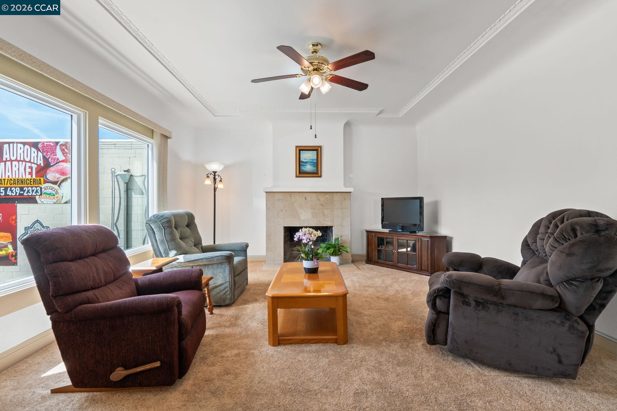272 West 10th Street Pittsburg, CA 94565 - Photo 5 of 29 a living room with furniture