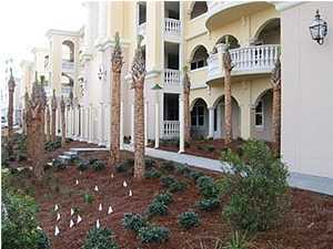 2421 West Scenic Highway, Unit D101 Santa Rosa Beach, FL 32459 - Photo 3 of 3 a front view of a house with a yard