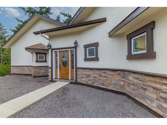 a view of an house with backyard space