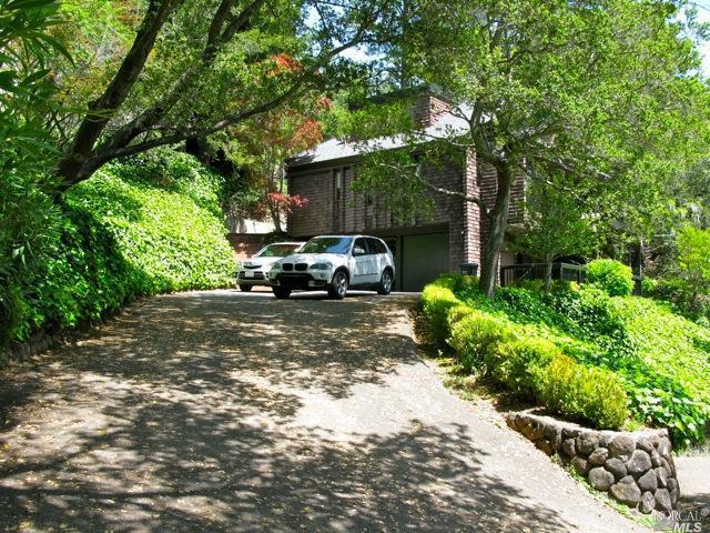 10 Hill Road Ross, CA 94957 - Photo 1 of 1 a view of a street with some trees