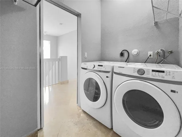 an empty room with closet and a bathroom