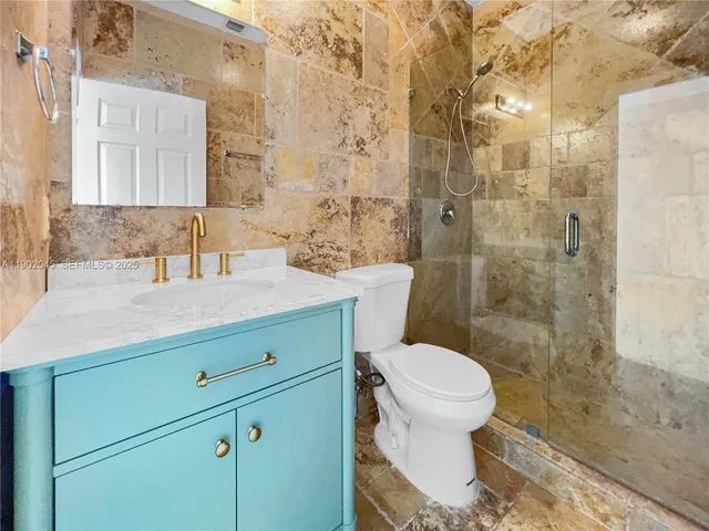 an empty room with a bathroom