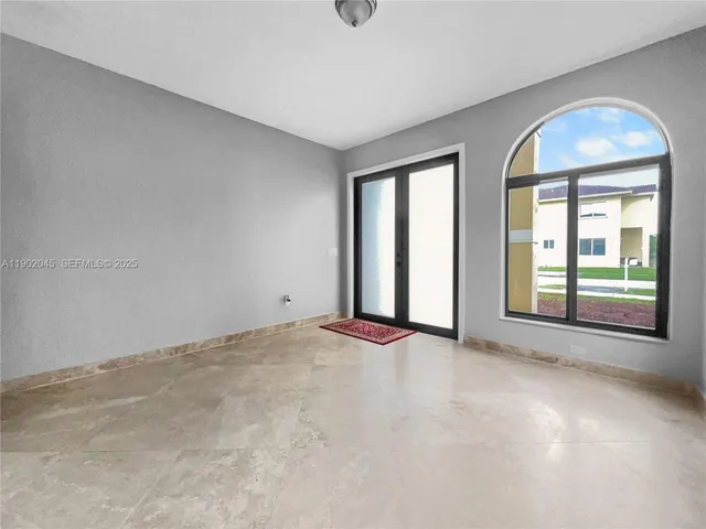 an empty room with windows