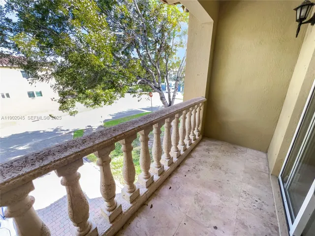 a view of a backyard with green space