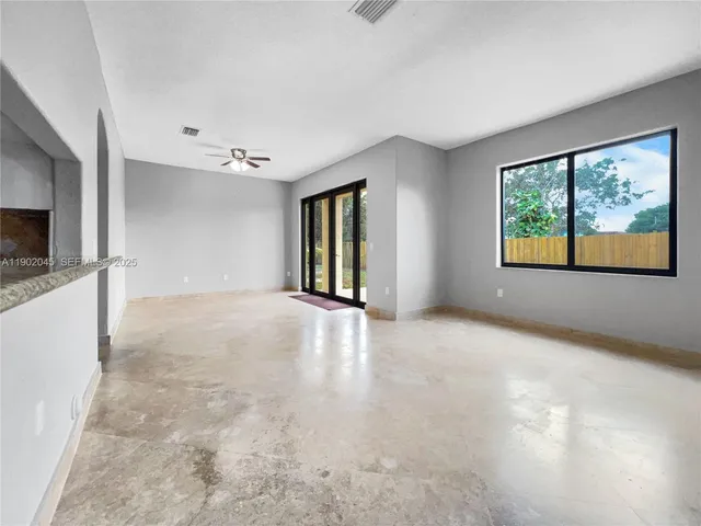 an empty room with windows