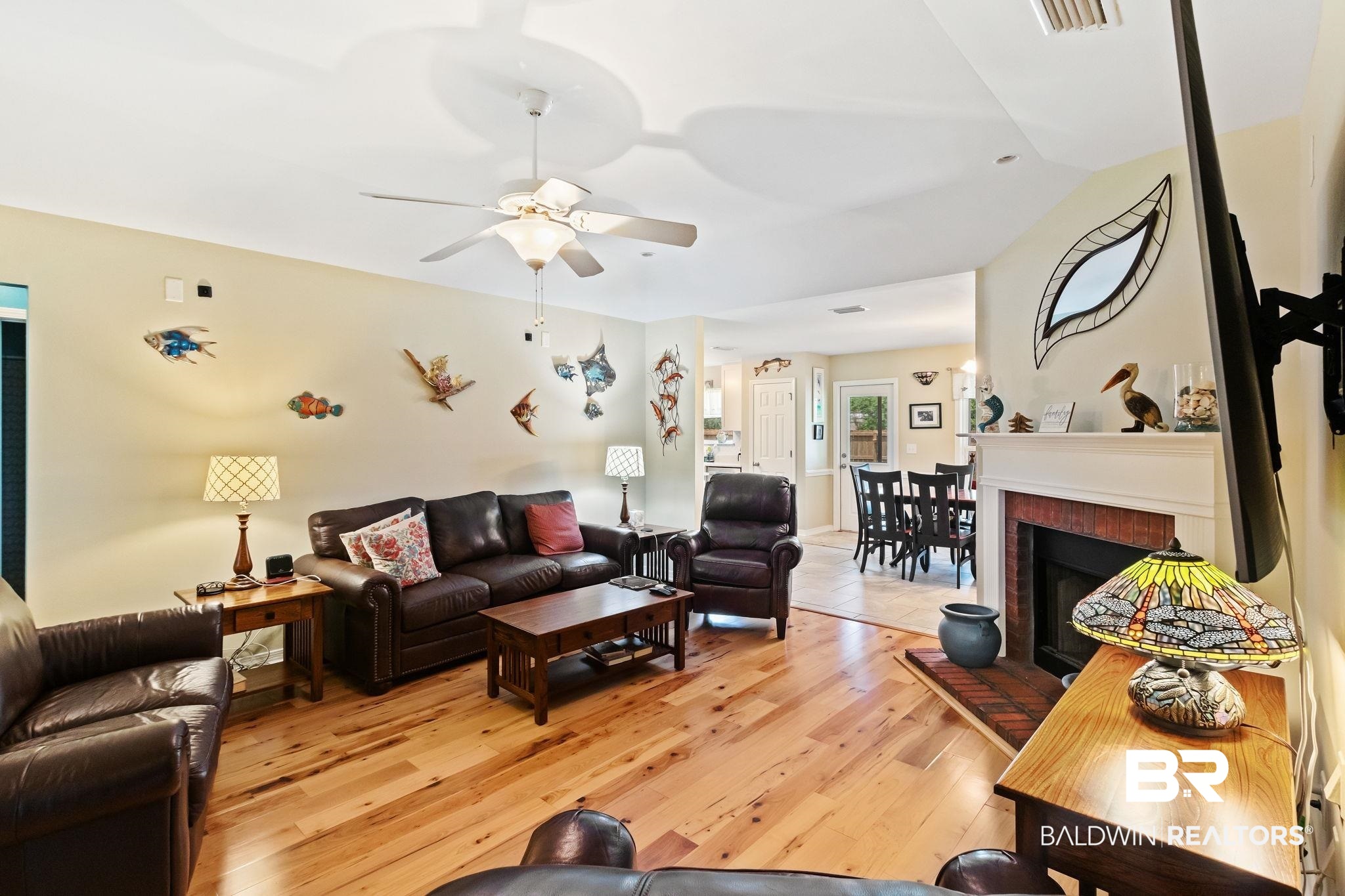 16898 Sugar Loop Foley, AL 36535 - Photo 13 of 67 Living room featuring light hardwood / wood-style floors, a fireplace, and ceiling fan