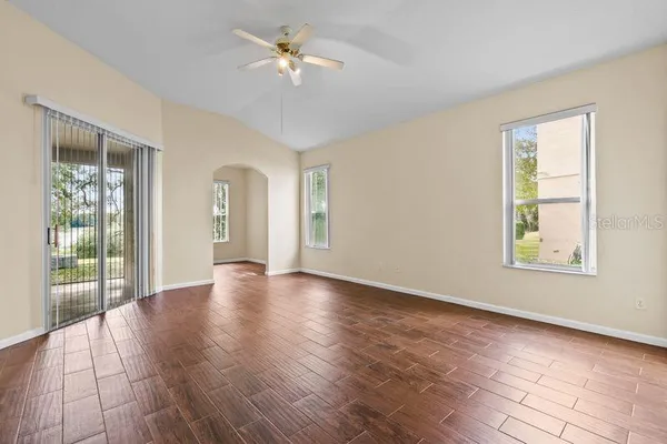 a bathroom with a double vanity sink a toilet and a mirror