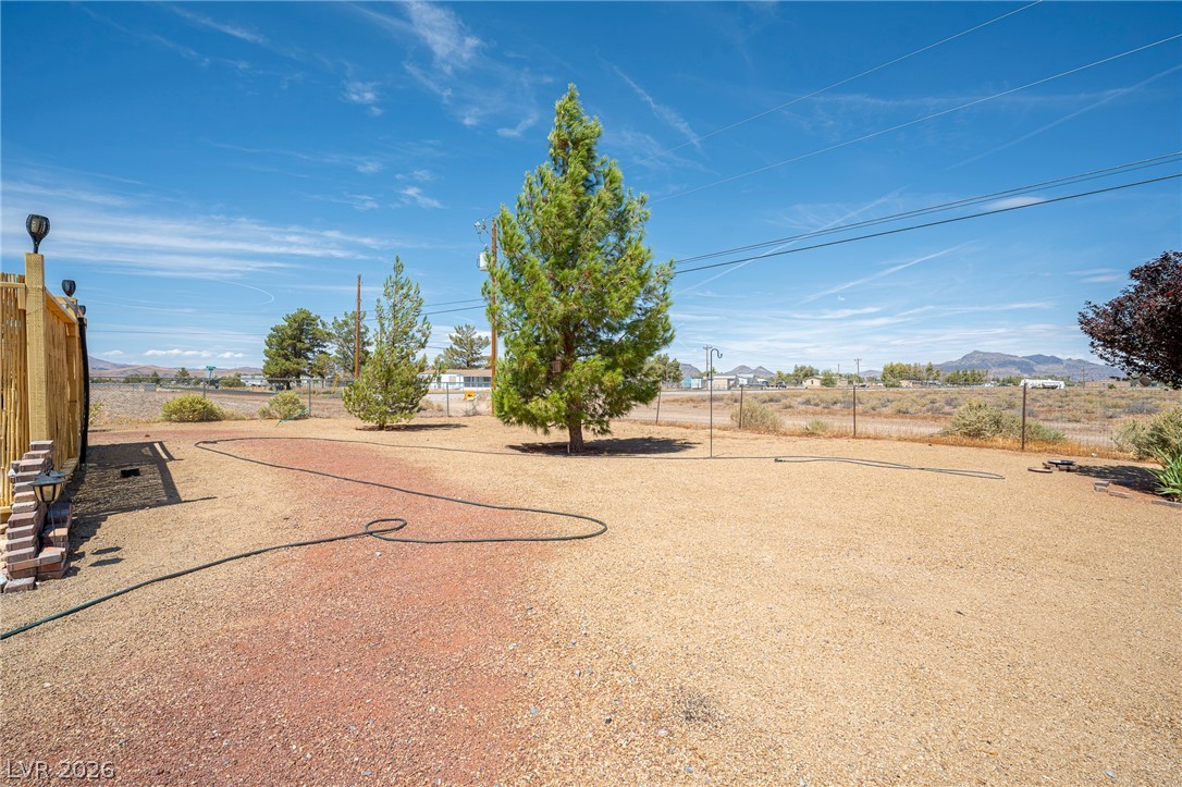 2970 Rio Rico Drive Pahrump, NV 89048 - Photo 26 of 41 Expansive desert grounds offer open space framed by distant mountain peaks.
