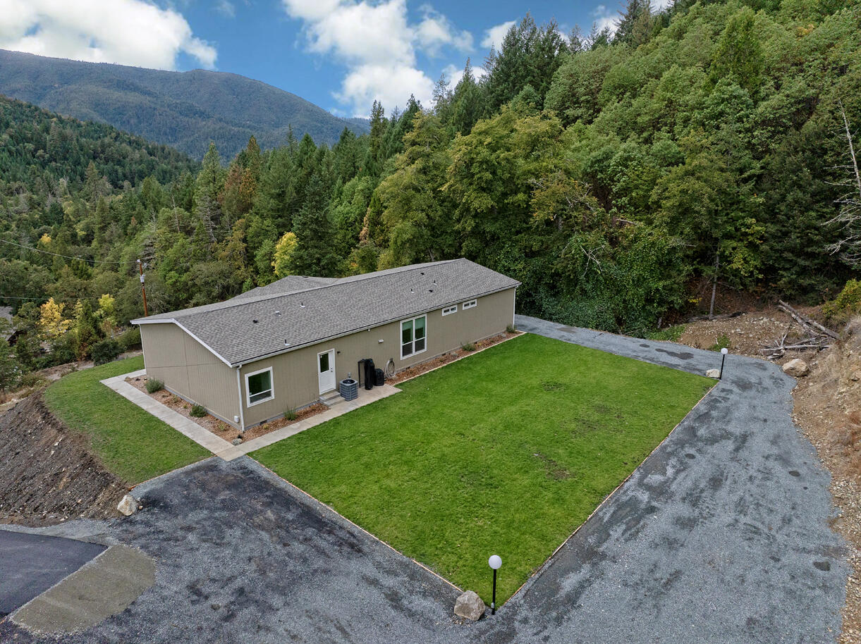 5572 Jumpoff Joe Creek Road Grants Pass, OR 97526 - Photo 20 of 38 a aerial view of a house