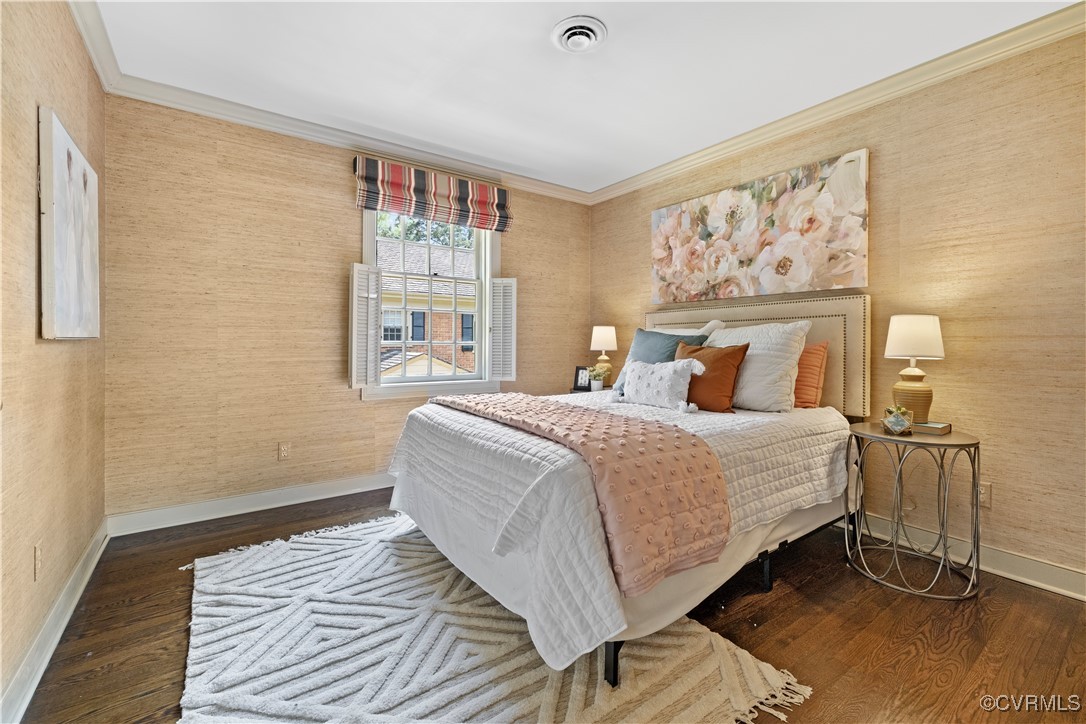 6161 River Road Richmond, VA 23226 - Photo 21 of 38 a bedroom with a bed and wooden floor